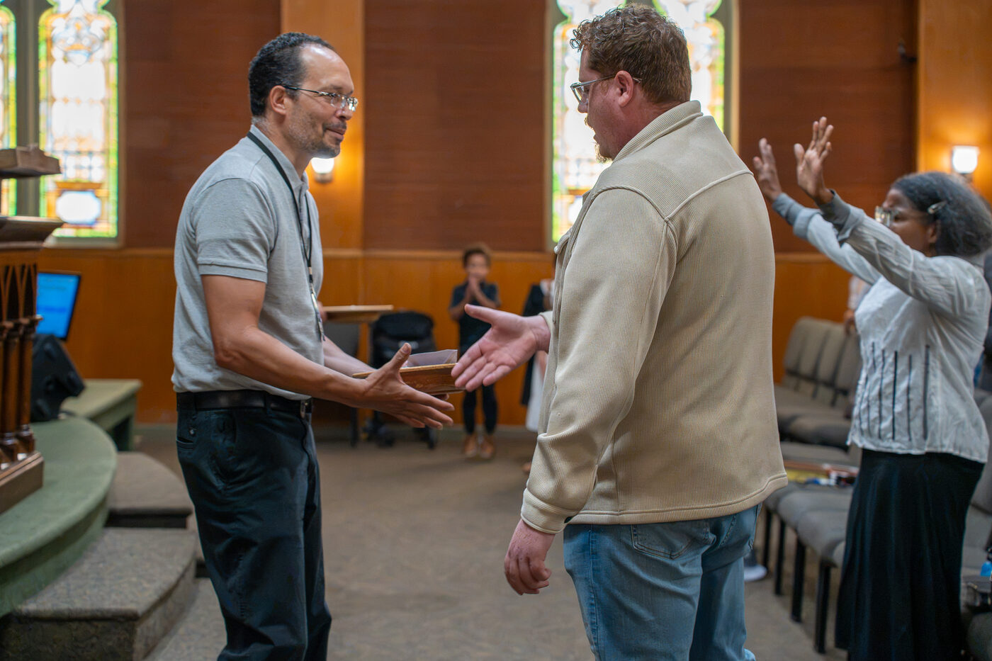 People greeting and connecting at a CLA gathering