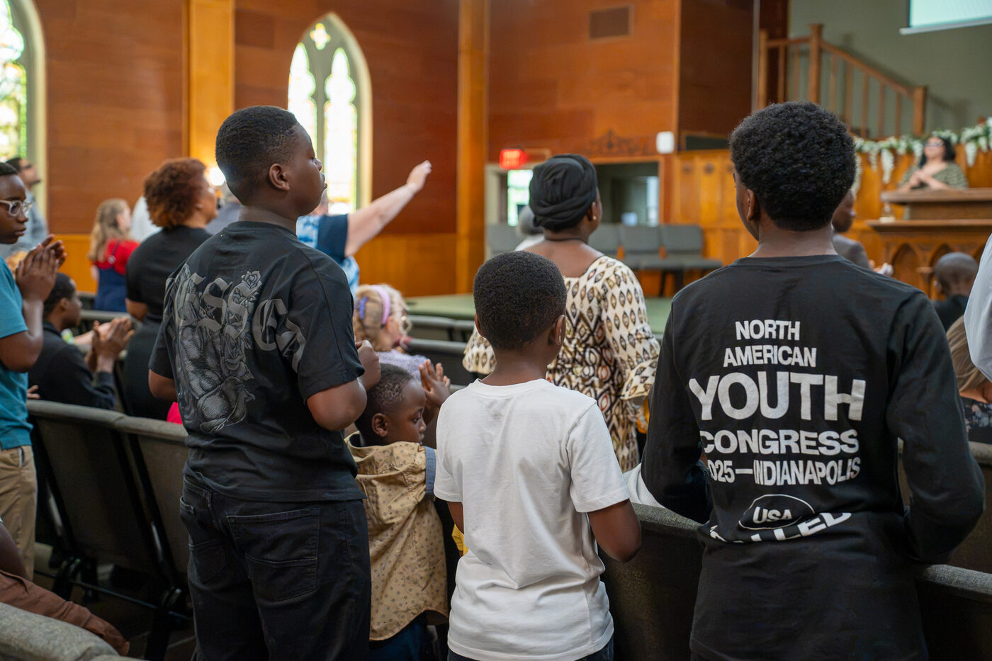Students worshiping together at CLA